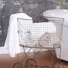 Creative Co-Op Vintage Reproduction Metal Laundry Basket on Wheels, Rust